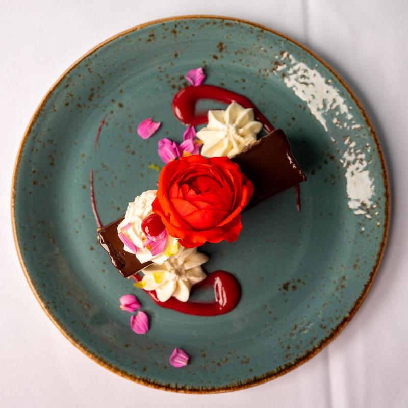 Chocolate dessert with rose